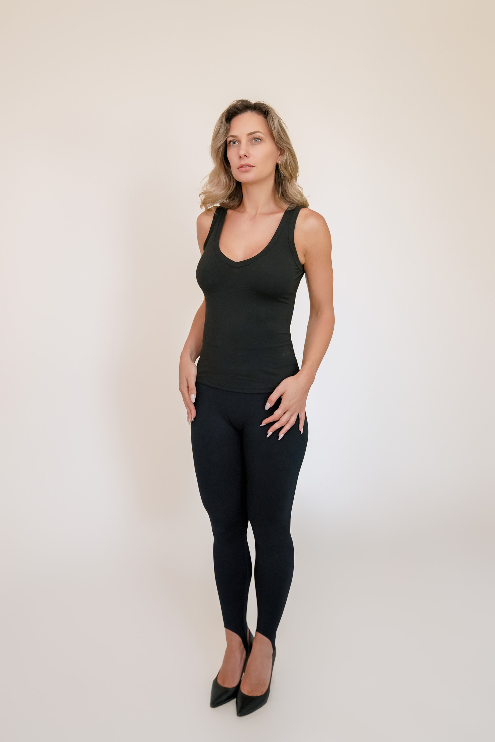 Olesia Prodan in a three-quarter full-body pose